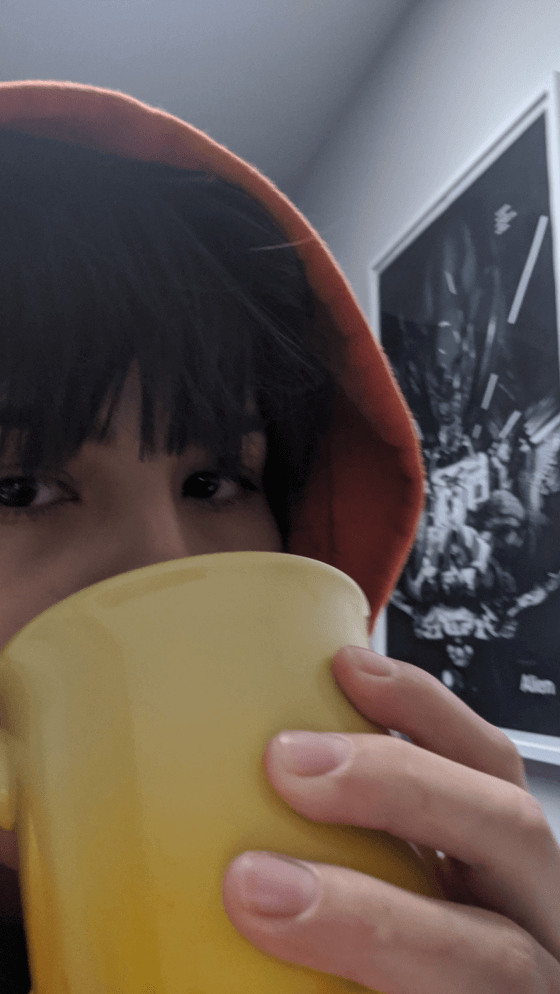 Katrina drinking from large mug